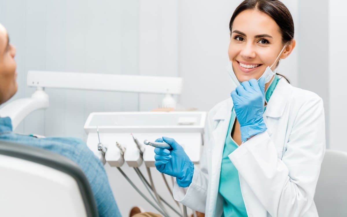 Dentist consulting with a patient in a modern dental office